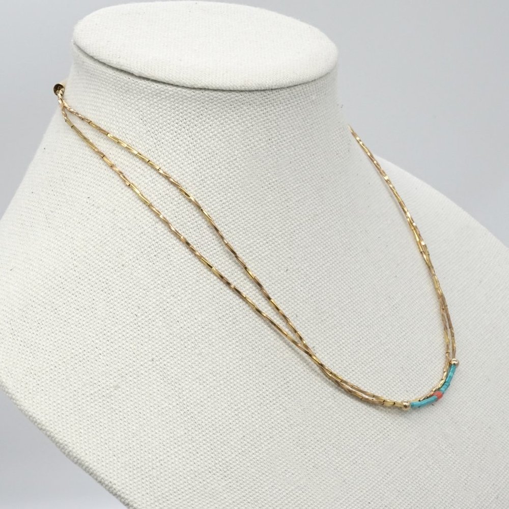 Minimalistic bead style necklace with blue rice beads. - Picture 2 of 2